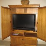 flat panel TV in a cabinet